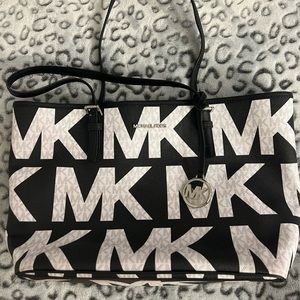 Black and white Michael Kors purse